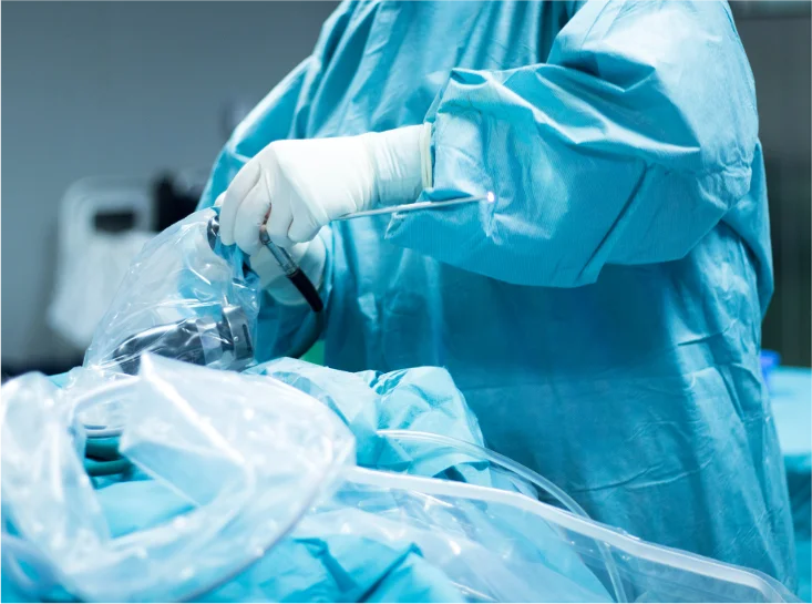 Surgeon performing hip arthroscopy to treat hip pain.