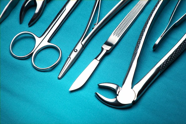Surgical instruments on sterile drape for knee replacement procedures in orthopaedic surgery.