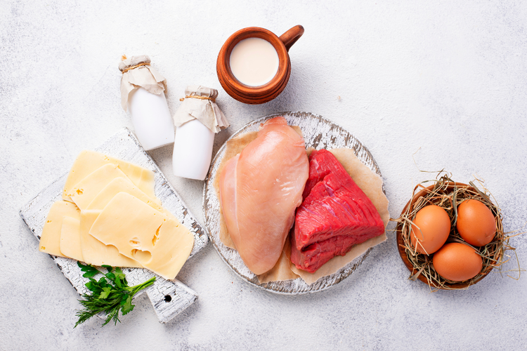 Protein-rich foods such as meat, eggs, and dairy to support muscle repair during marathon recovery.